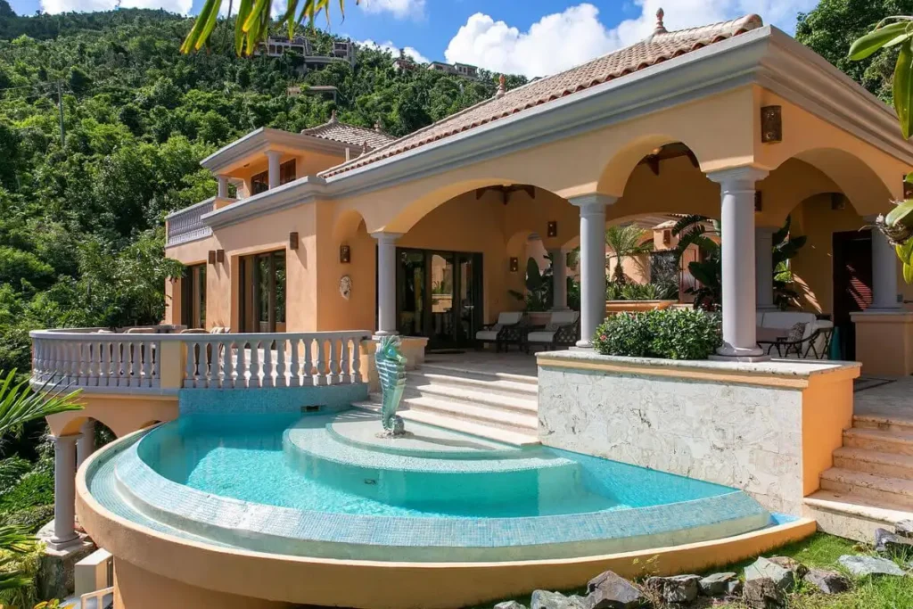 Looking across the private pool into the spacious patio at Villa Delfina.