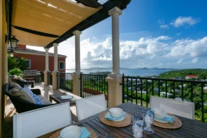 A patio view from Twilight Villa overlooking nearby Cruz Bay